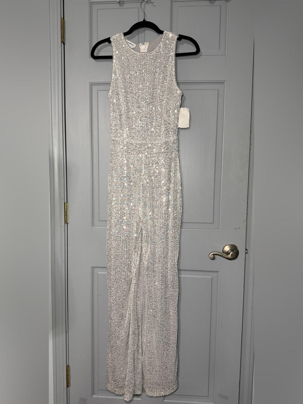 bebe Silver Sequin Jumpsuit nwt with flaws!  See photos and description
